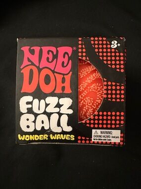 New Doh Fuzz Ball Wonder waves in orange.